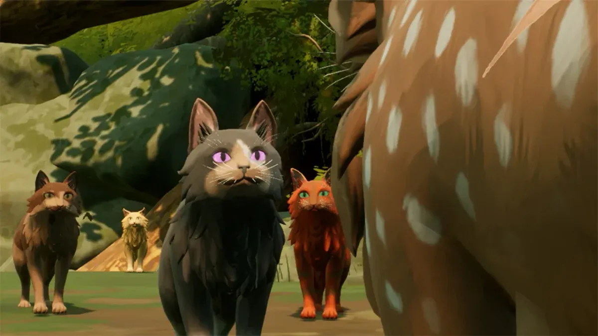 Varios gatos de distintos colores en un entorno boscoso, en una escena del videojuego Warrior Cats: Clans of the Forest.