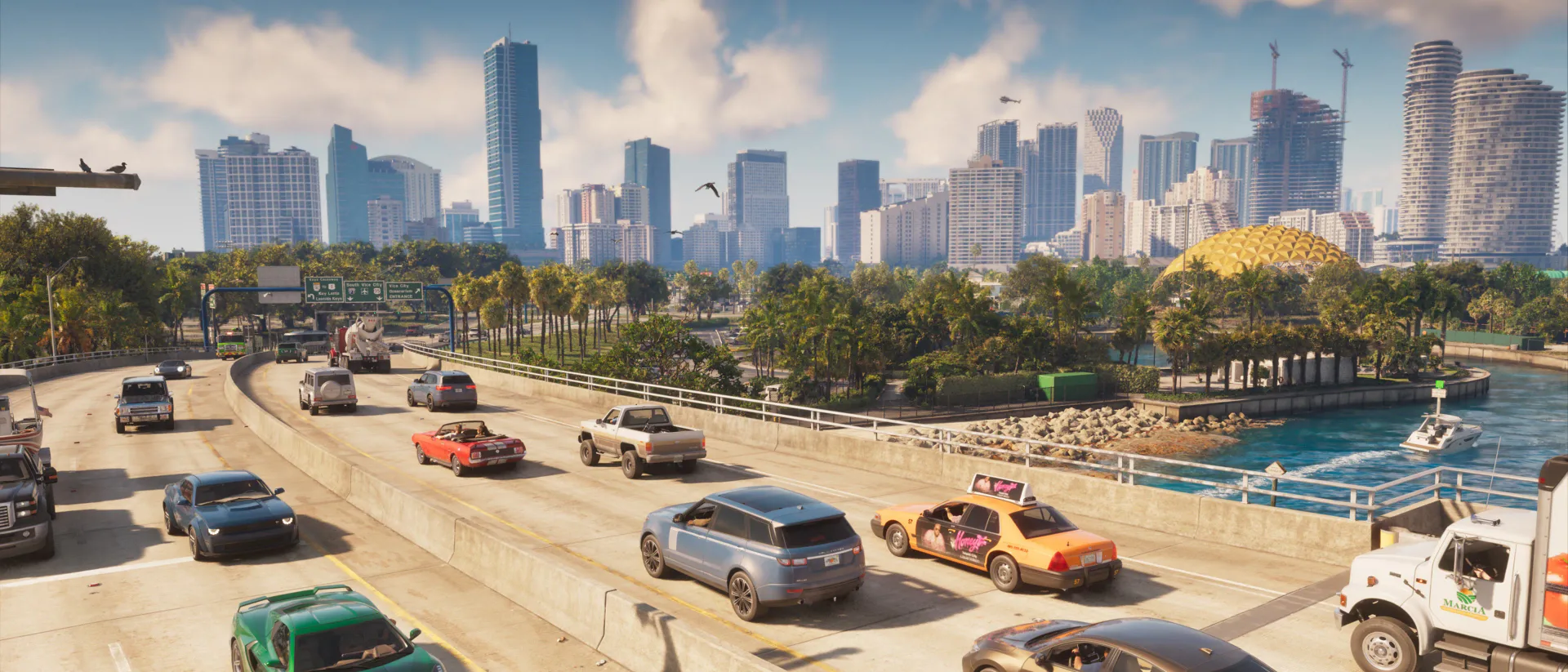 Captura del tráiler de GTA 6 mostrando una autopista con tráfico y el horizonte de la ciudad de Vice City.