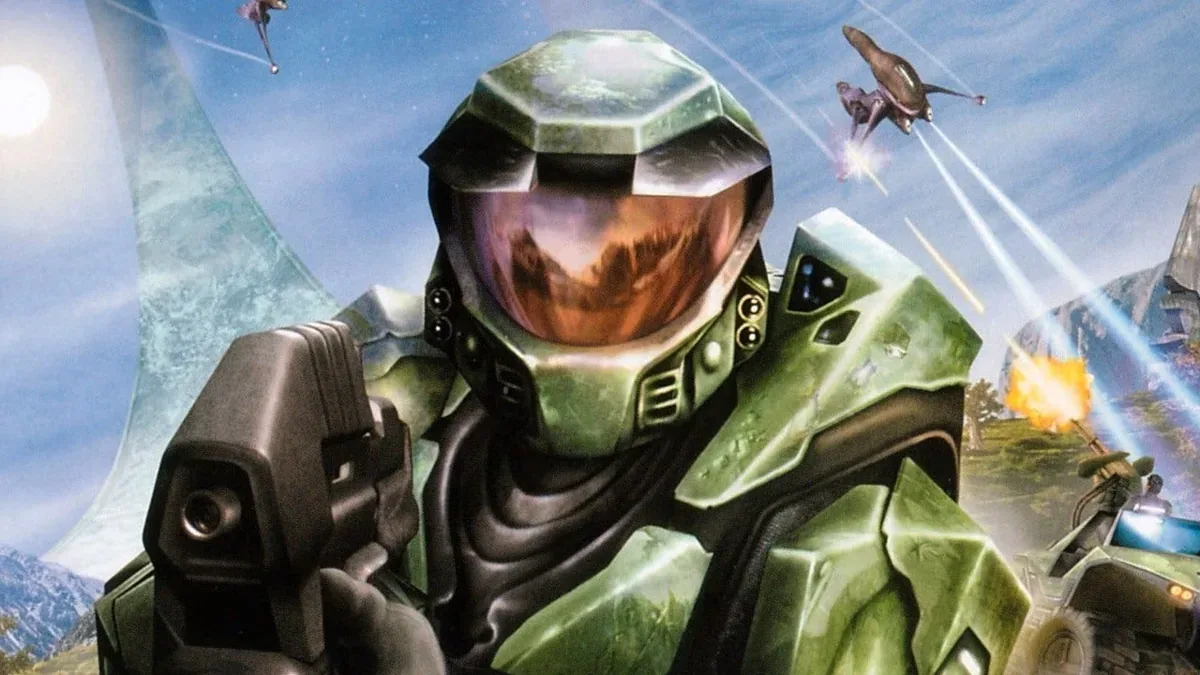 Arte promocional de Master Chief con su armadura verde icónica sosteniendo un rifle de asalto en el universo Halo.